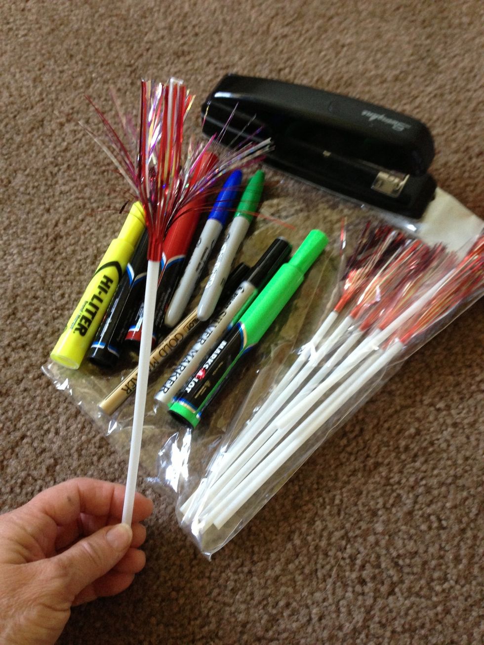 Assemble colored markers. (RED & BLACK are a must) I like to add these festive party straws to them stand out.