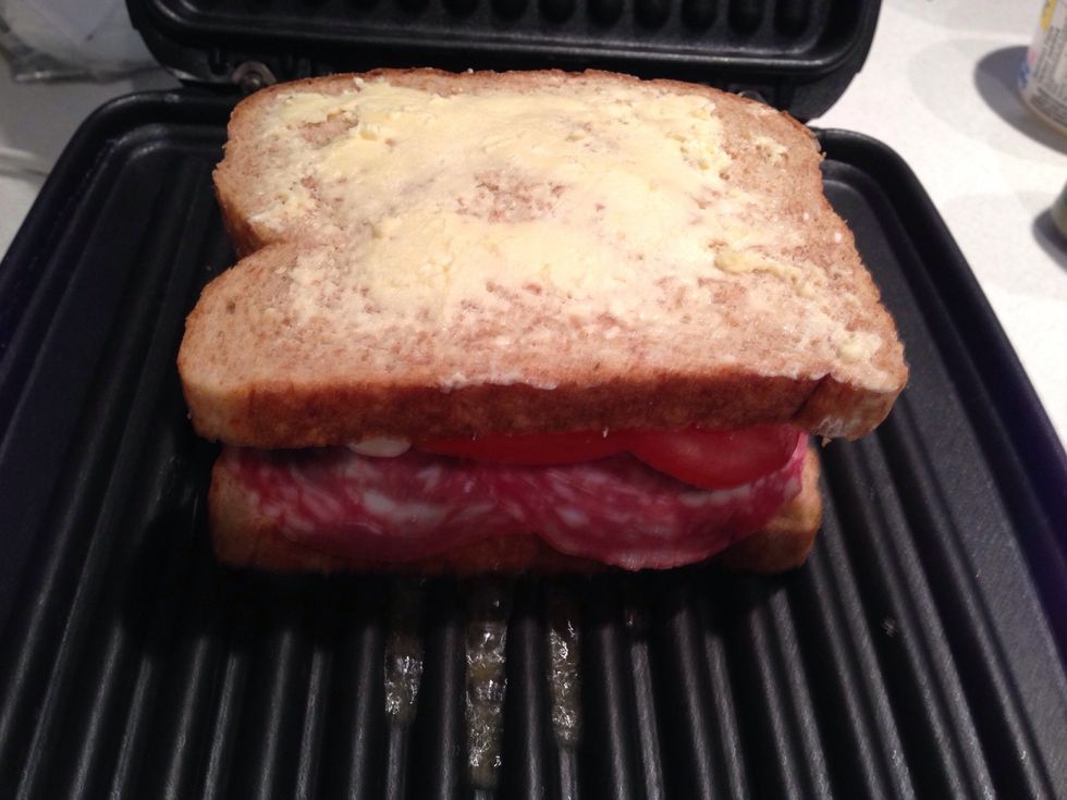 Assemble sandwich and place on preheated grill for 5-7 minutes