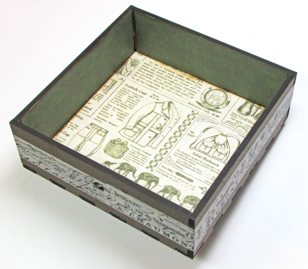 Assemble the drawer. Wrap with washi tape for more stability. Punch the hole for the handle.