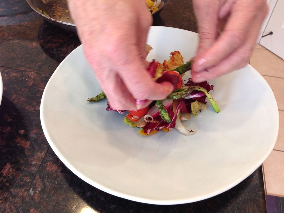 Assemble the potato hash and roasted veggies together, seasoning with a squeeze of lemon and salt.