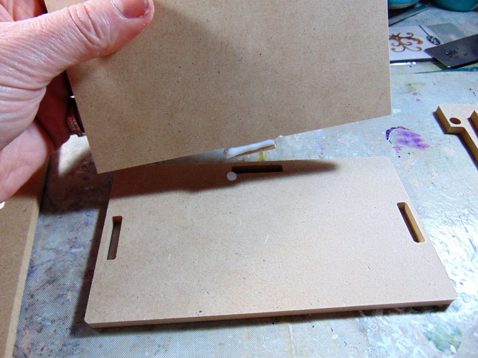 Assemble the wooden hutch unit. I use glue in the slots just for extra strength.........