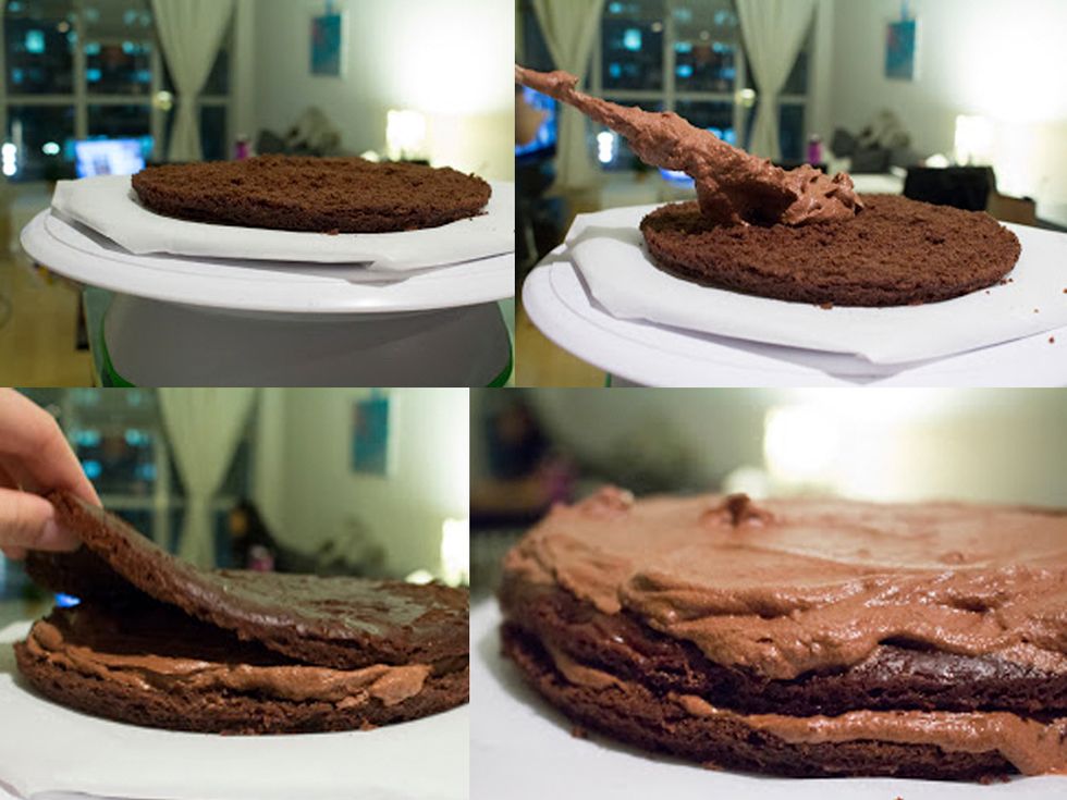 ASSEMBLING THE CAKE: Use a flat surface, here I use a rotating cake stand and parchment paper. Add a generous amount of chocolate mousse between cake layers.
