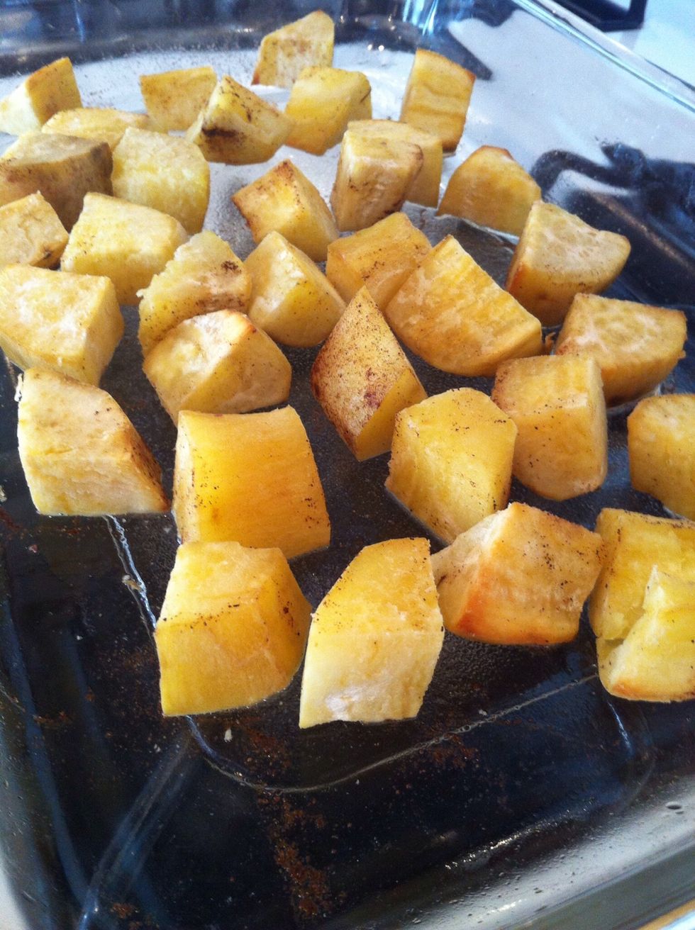 At 15-20 minutes through baking, remove the dish from the oven and turn the sweet potato wedges over. Then place them back in the oven for the remainder of the time.