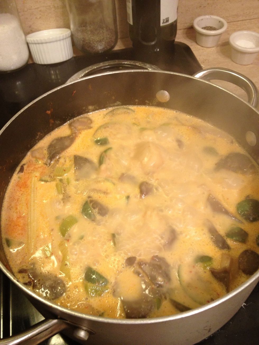 At full boil, bring the heat down to a simmer and cover with a lid.