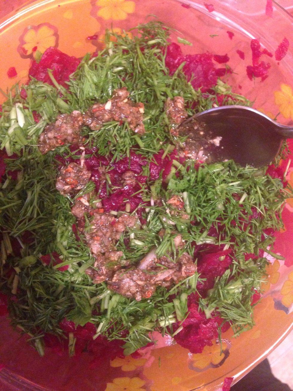At last add the sauce and chopped dill to the grated beetroot and mix well