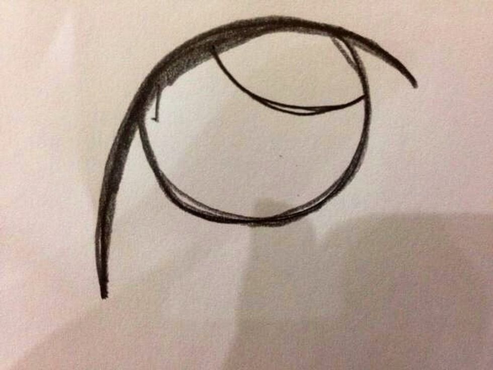 At one corner, draw a circular line like this one.