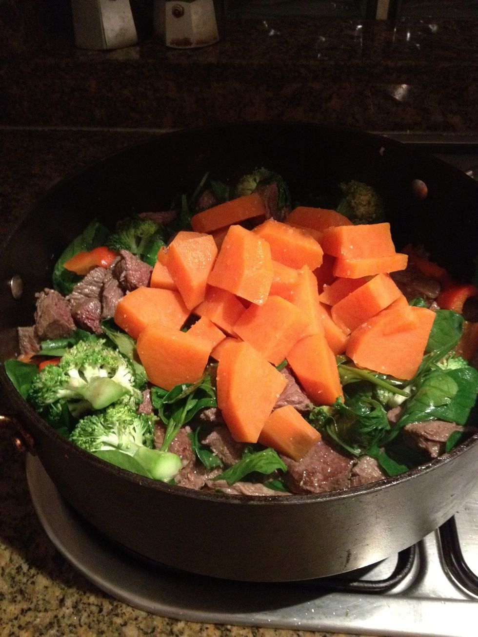 At the end, after the spinach has been mixed in, add the sweet potatoes on the top