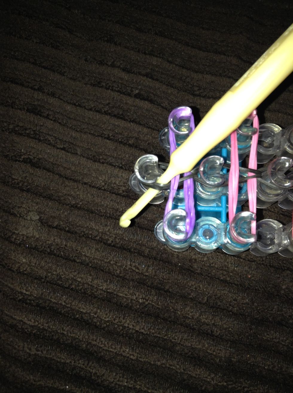 At the end, loop your hook through the band.