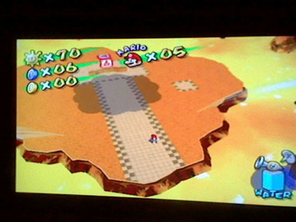 At the end of the river, stomp on the red box.