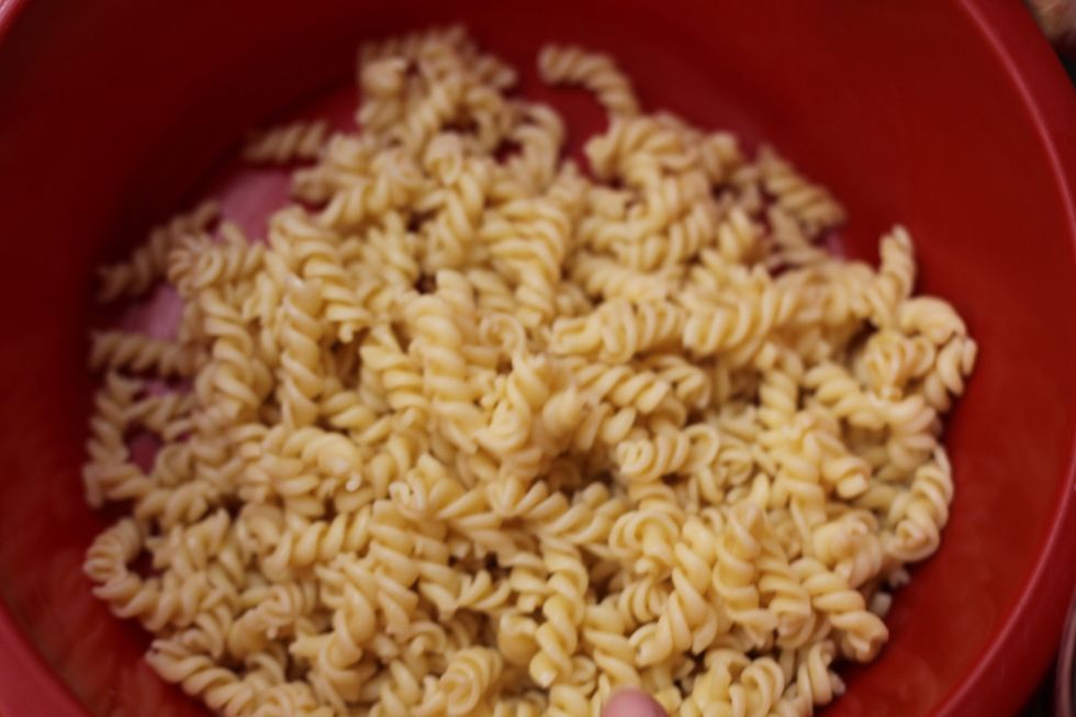 At the same time as your b\u00e9chamel is cooking, boil the pasta for about 8 minutes. Hint: boil pasta only with water and a pinch of salt. Don't add oil. It just wastes oil as it floats to the top.