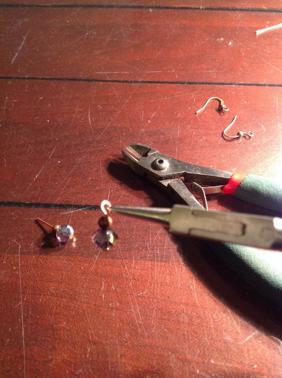 At the top of the beads, bend the headpin to straighten out the rolled loop