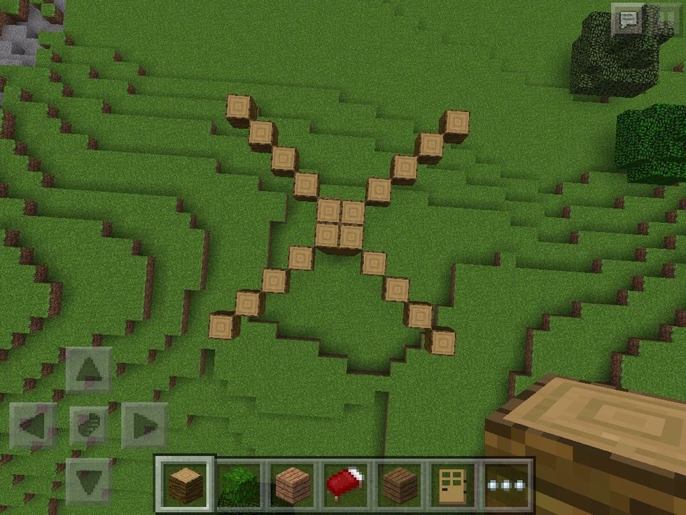At the top of the tree make this shape, it goes out 4 on each side. To get the logs the face up I had to place one under it and build up