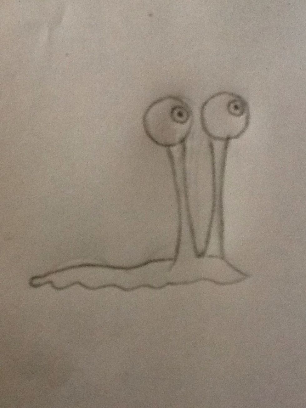 At the top right corner of his eyeballs, draw smaller circles for the iris, and even smaller circles inside the iris, for the pupil.