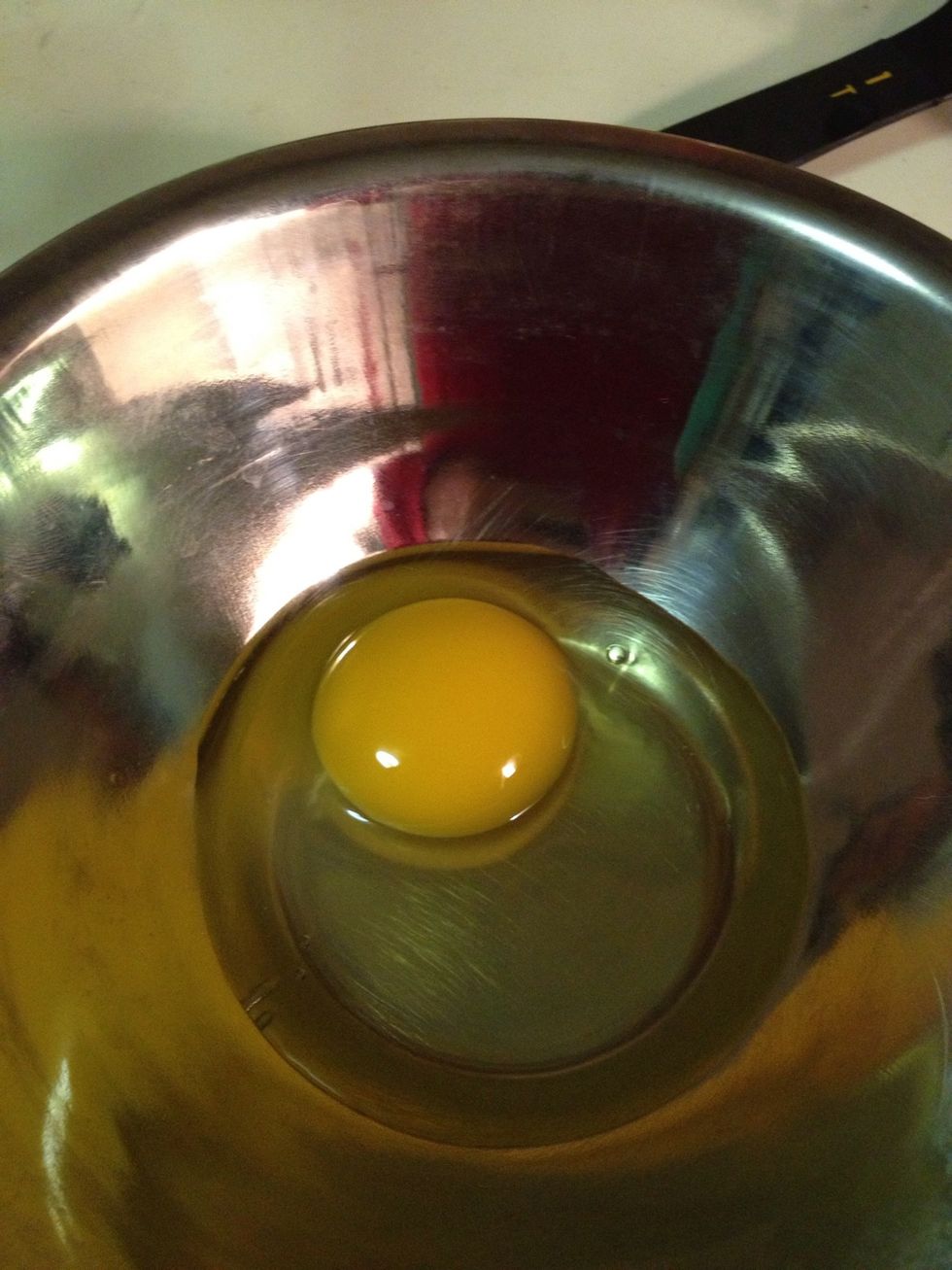 At this point, crack your egg into a bowl.
