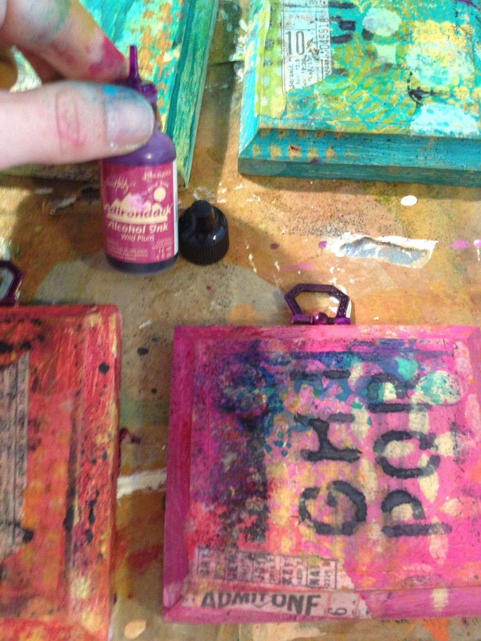 At this point I realized the hanging hooks were pretty funky looking. No problem, I covered them with Tim holtz alcohol ink in wild plum. These inks are perfect for coloring metals!