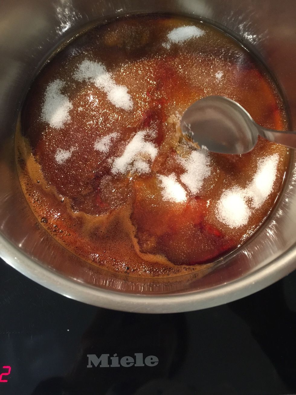 At this point use the spoon to mix in the unmelted sugar