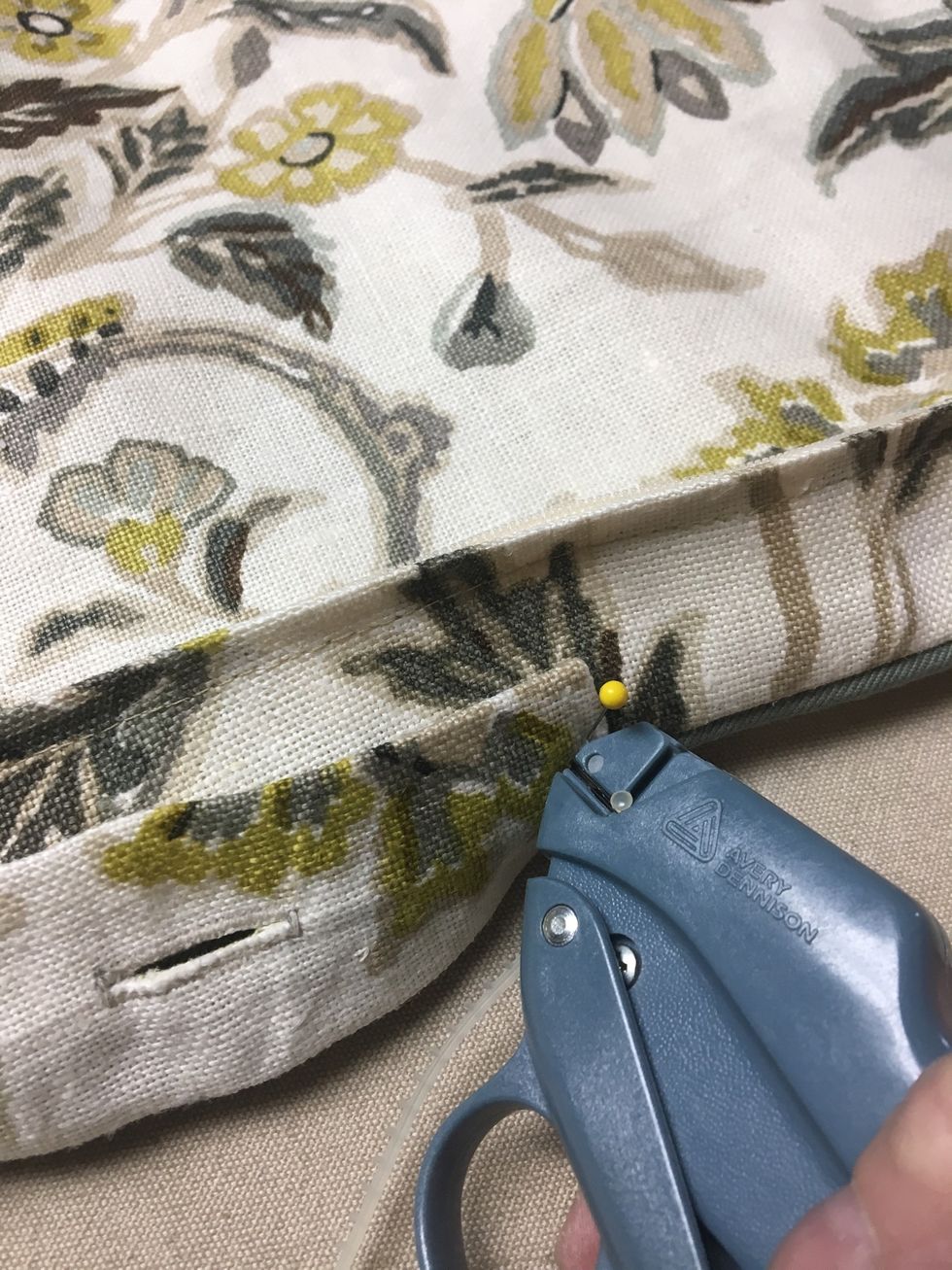 At this point we use our Tack Gun to attach the tabs.  It's a lot quicker.  But if you don't have a Tack Gun you can stitch each tab to your pillow.  Set aside.