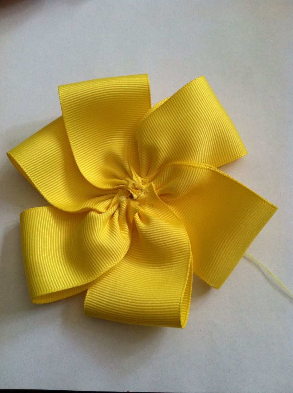 At this point you could do many things with it. I added another layer of petals and a center.... Refer to step 26 on how to close off the thread.