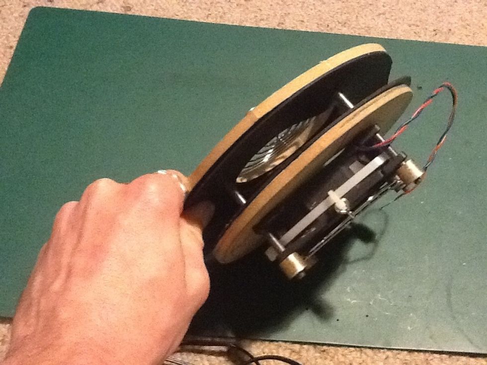 At this stage you fan is almost done. The clmping action as above is in order to wrap around and "tuck in" the inflation tube into the clamp assembly