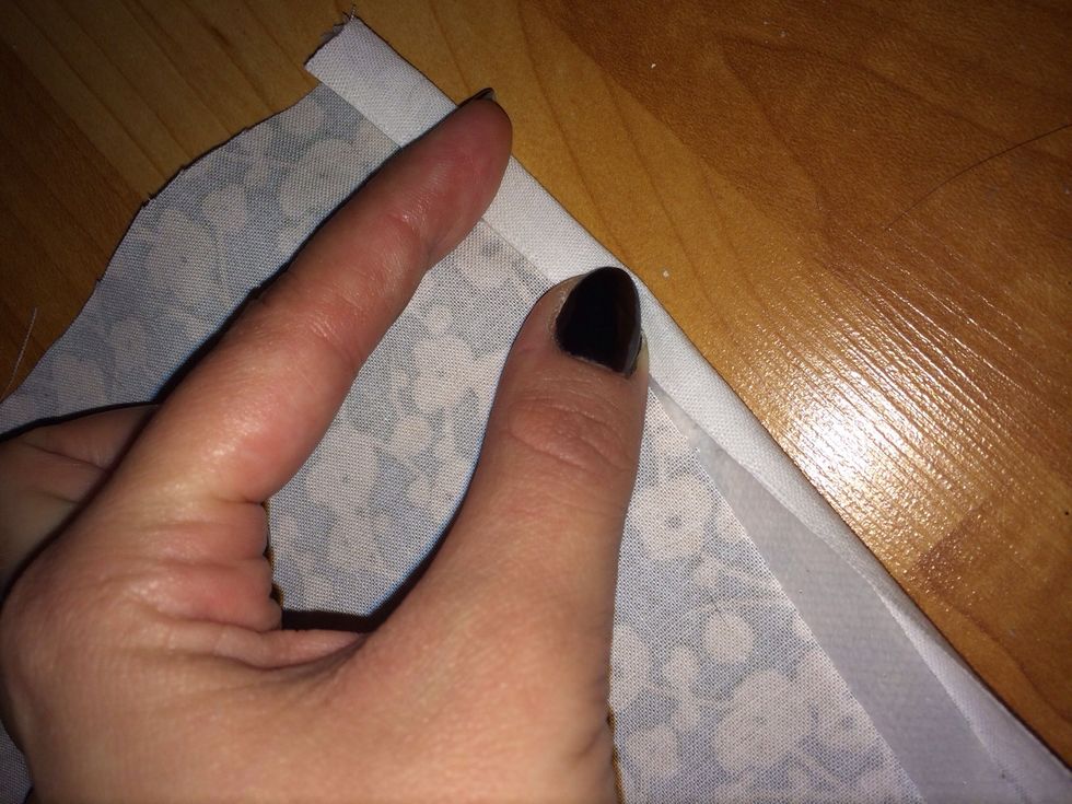 At this time warm up your iron. Set to "no steam". Fold over the same length as the tape.