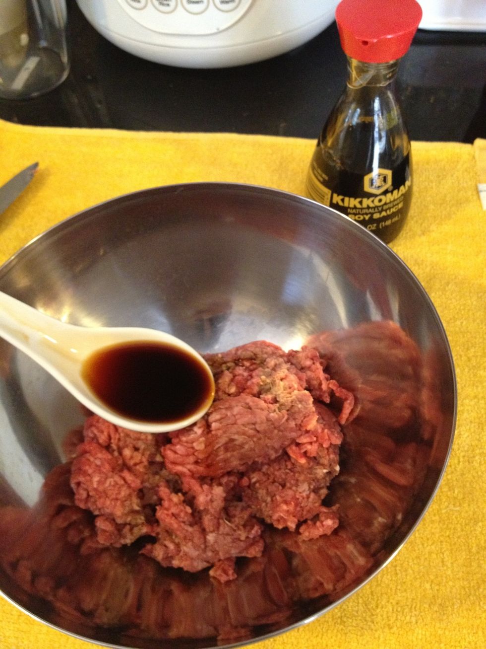 At two Tablespoon of soy sauce, add 2 tablespoons of rice wine and some smash ginger marinate for 15 minutes or more.