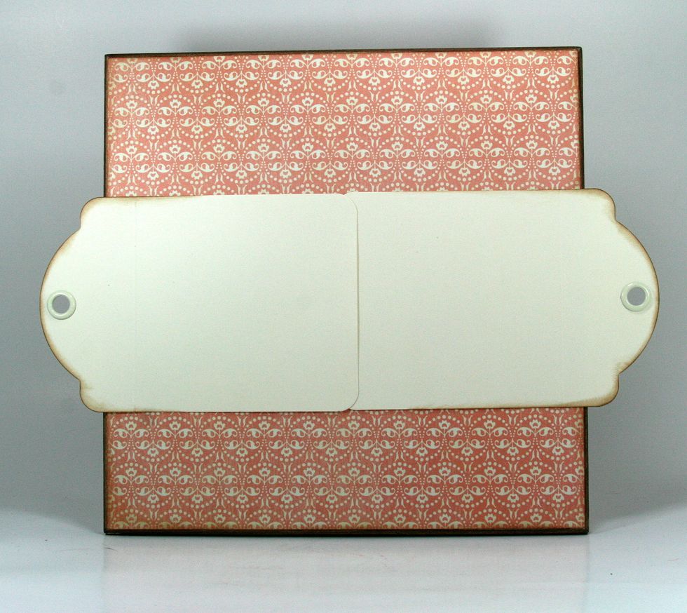 Attach 2 tags from the Ivory Medium Tag Book from Graphic 45 Staples.