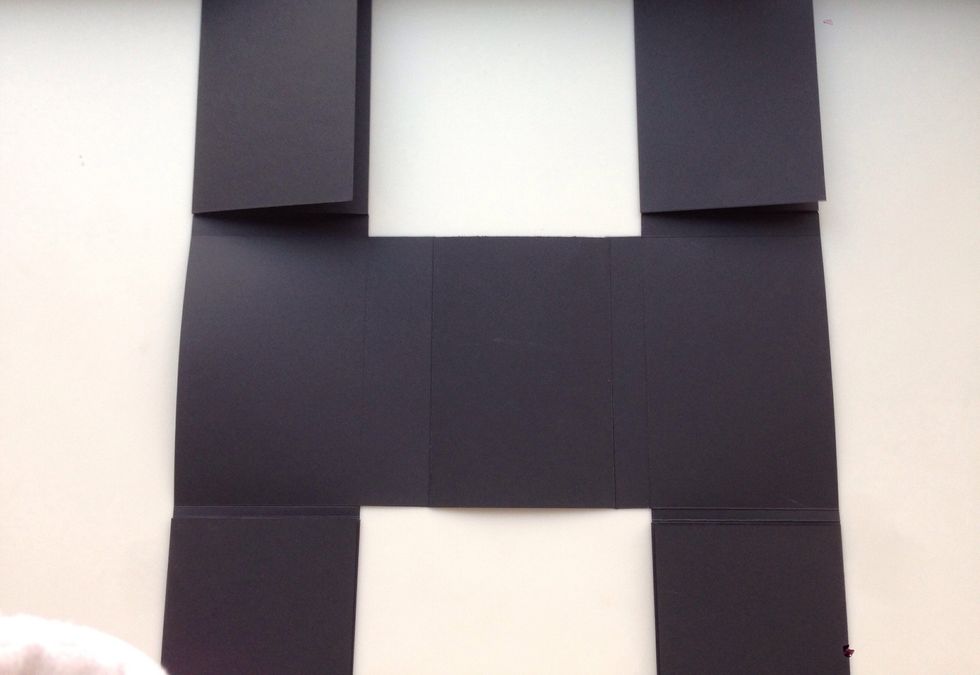 Attach 6" x 12" folded rectangles to top and bottom tabs of side sections.