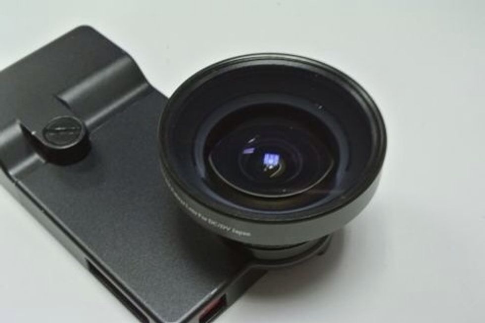 Attach a fisheye lens.