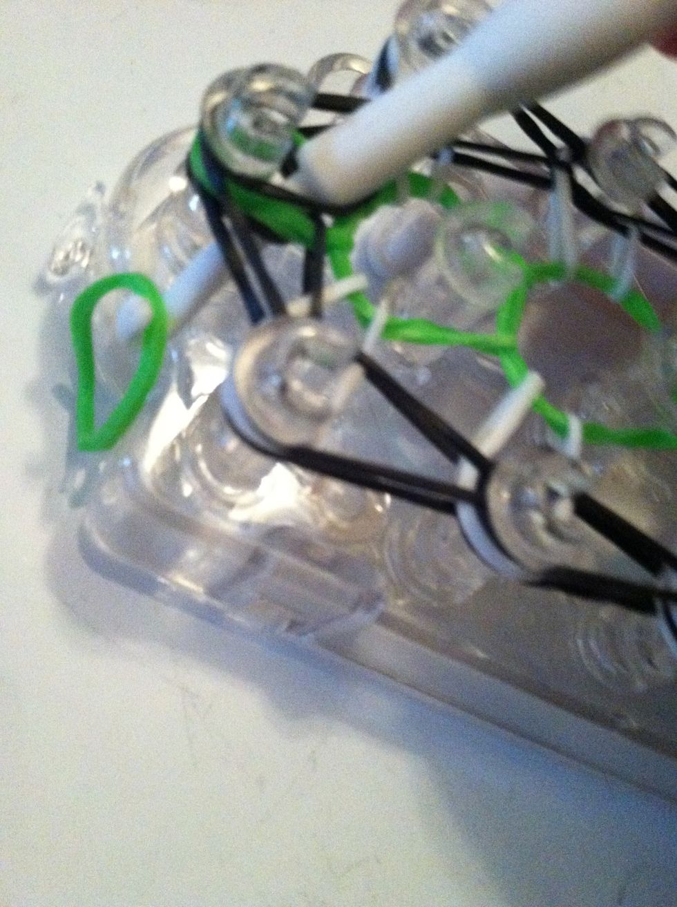 Attach a green band to the hook.