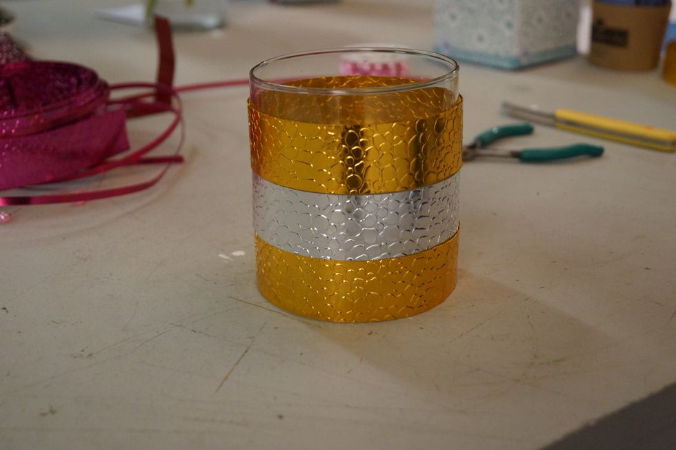 Attach appropriate lengths of Snakeskin Wire to a vase of your choice with UGlu.