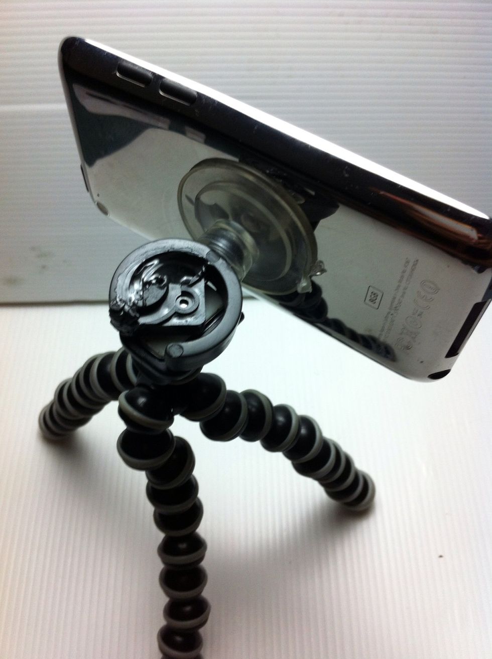 Attach camera phone with tripod, then camera ready for use