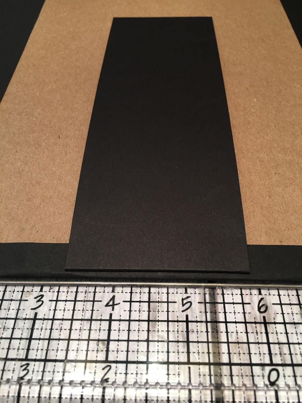 Attach centered along the bottom edge of the first 9" section