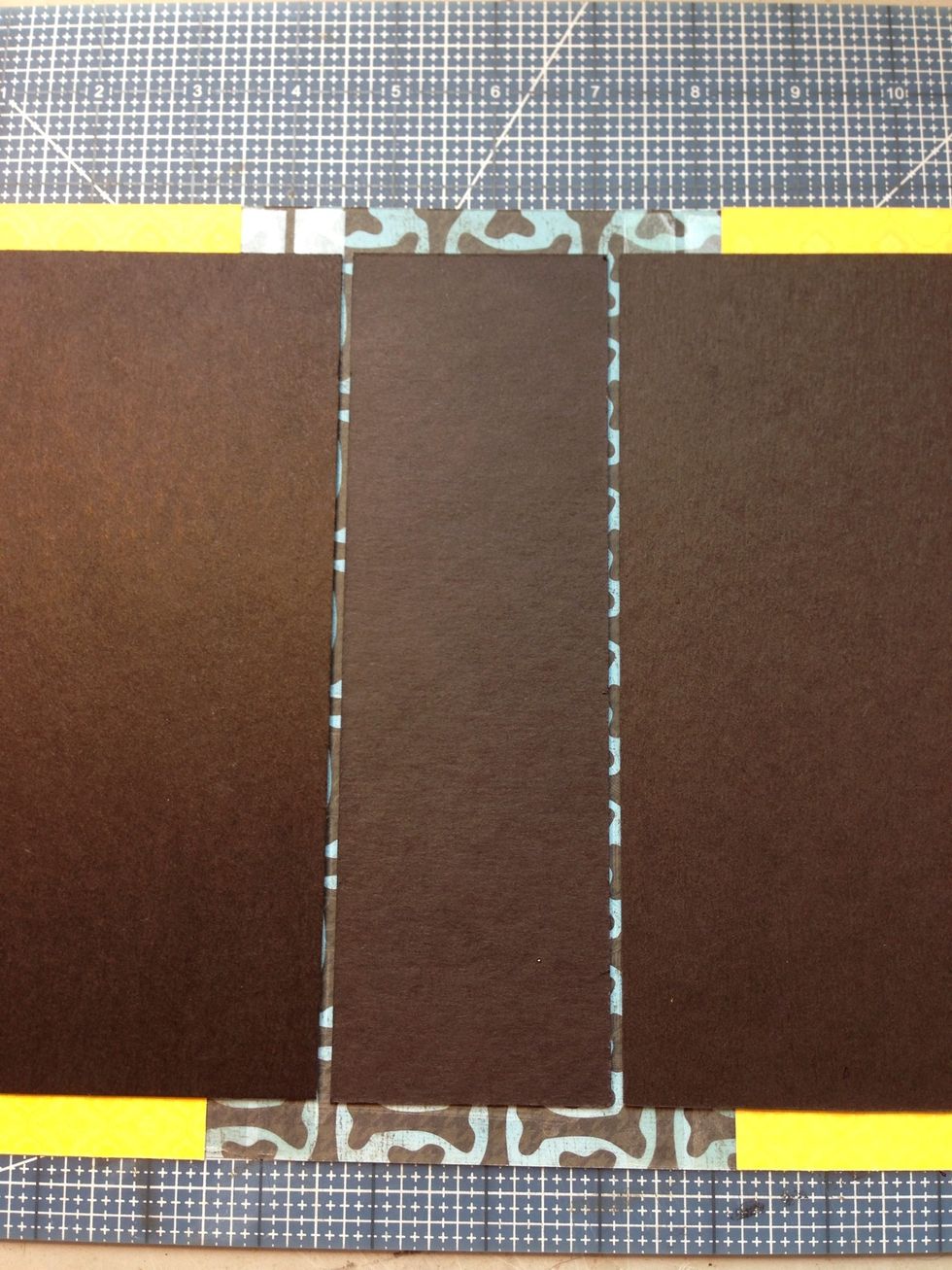 Attach front and back covers to spine cover with strong adhesive or glue.