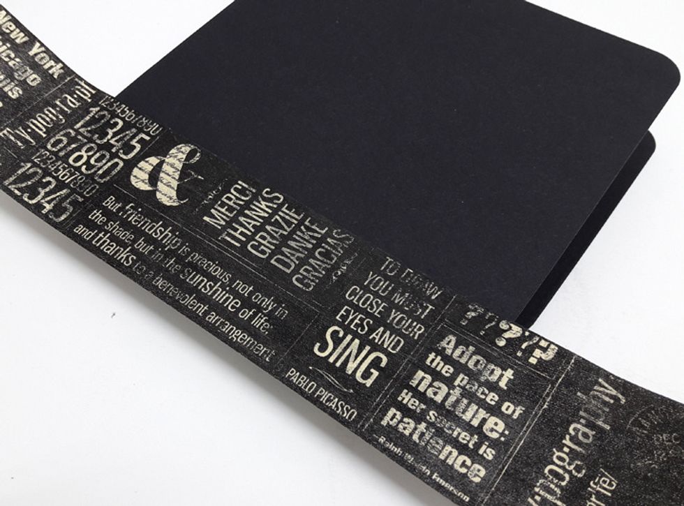 Attach half width of washi tape to front of mini album.