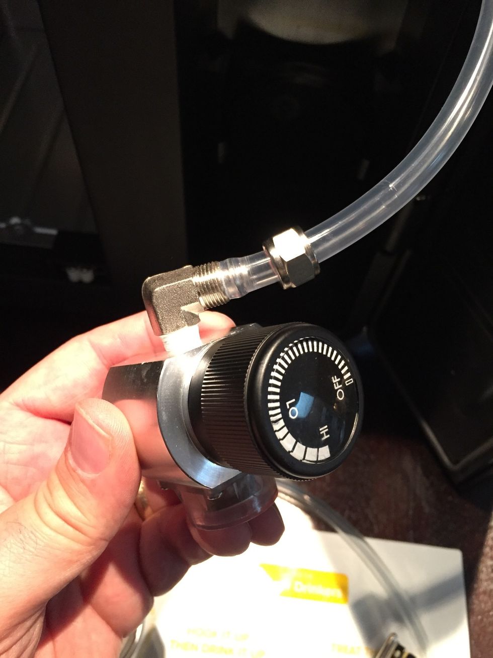 Attach hose to regulator.