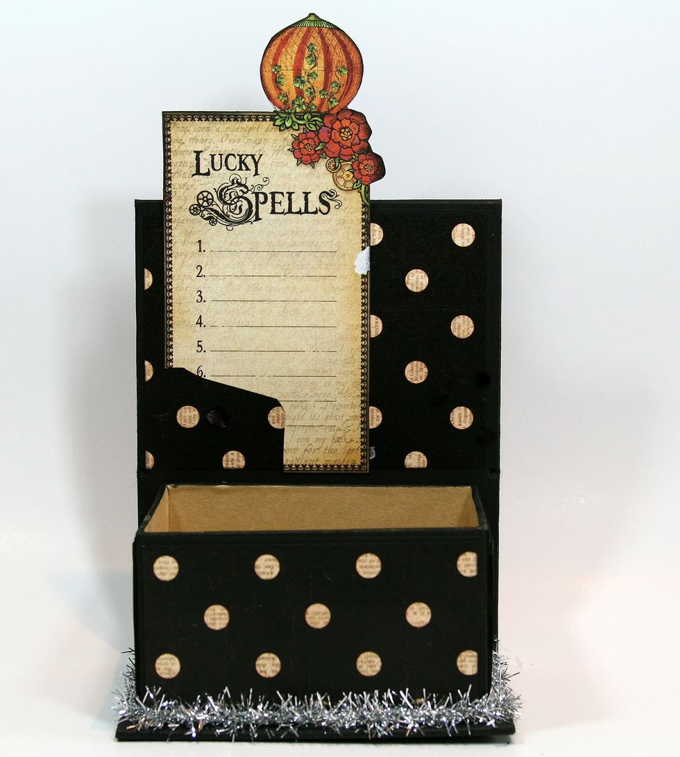 Attach Lucky Spells image with small balloon behind.