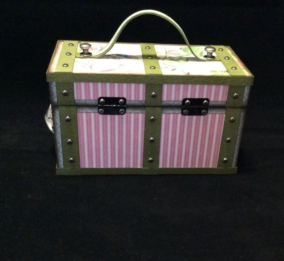 Attach metal embellishments and hinges to back of trunk as pictured.