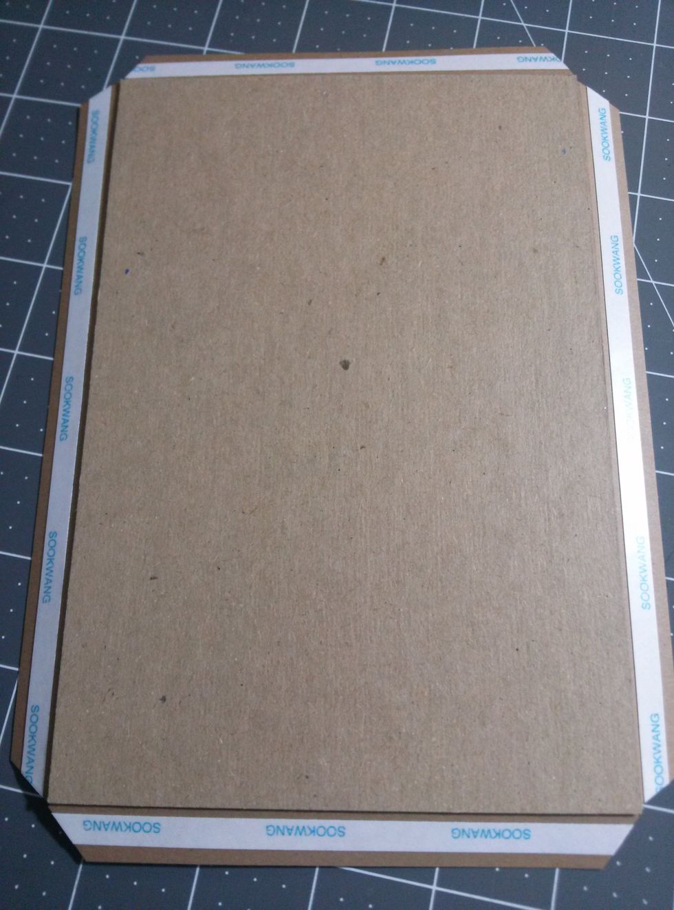 Attach one side of the construction strips to the bottom of box on each side