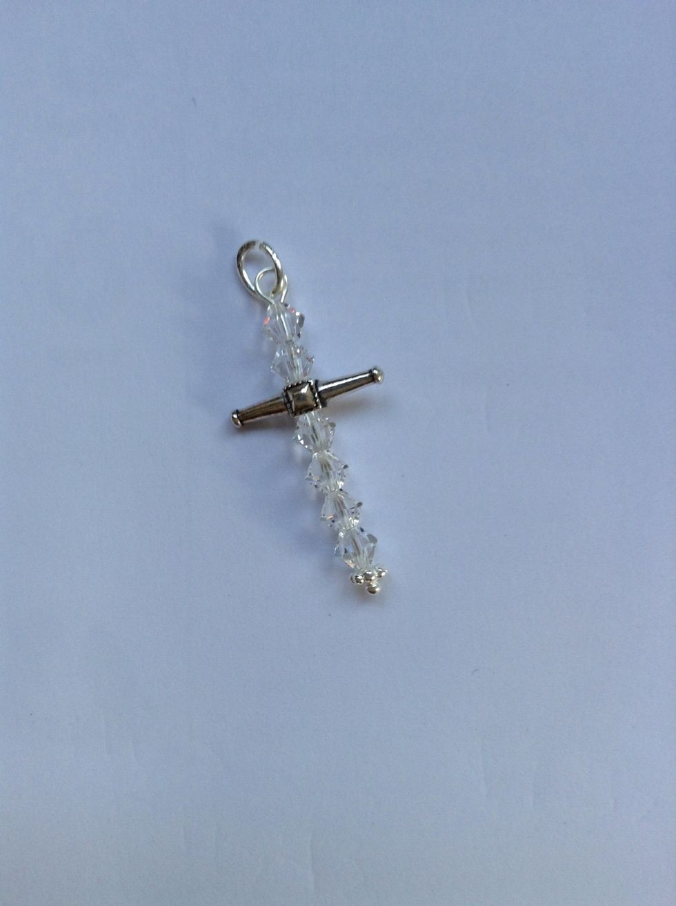 Attach oval jump ring.