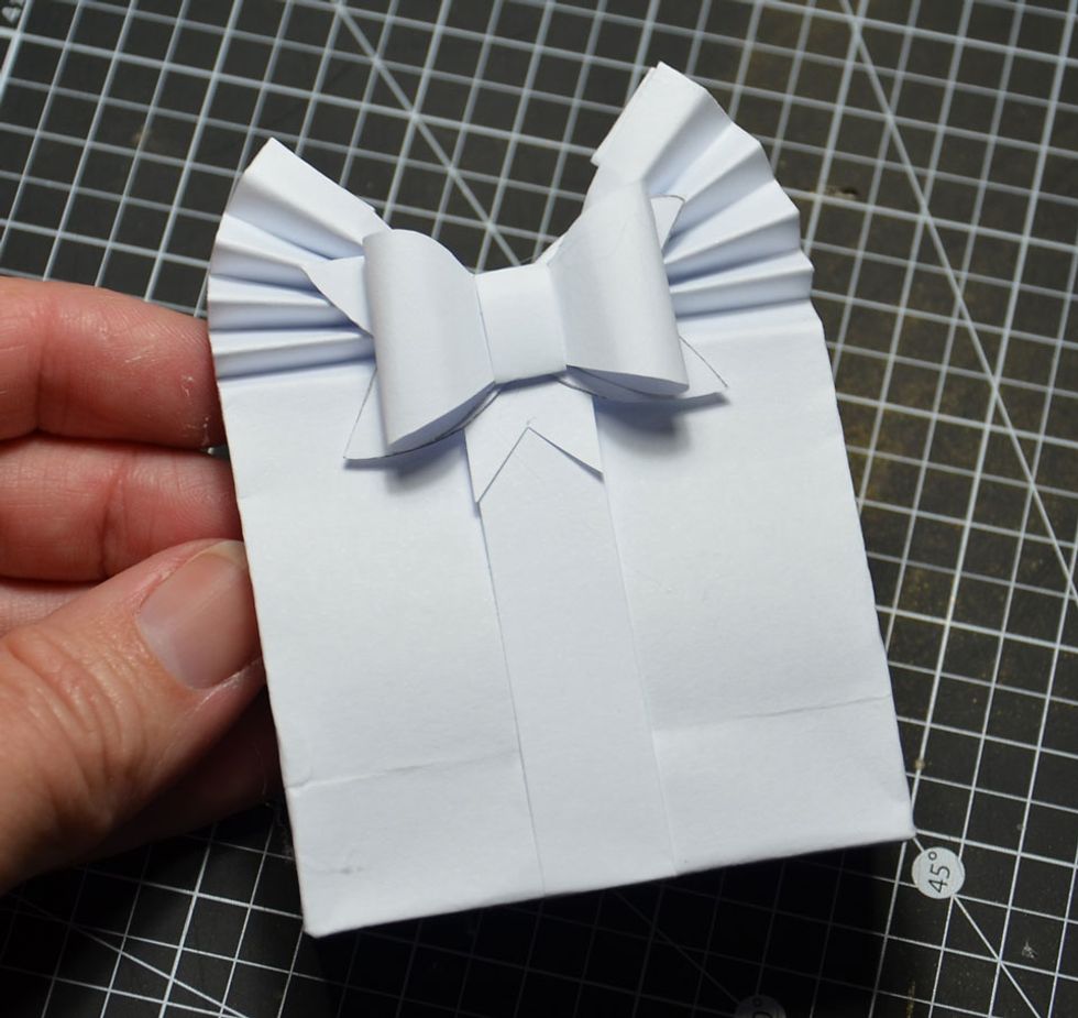 Attach paper bow.