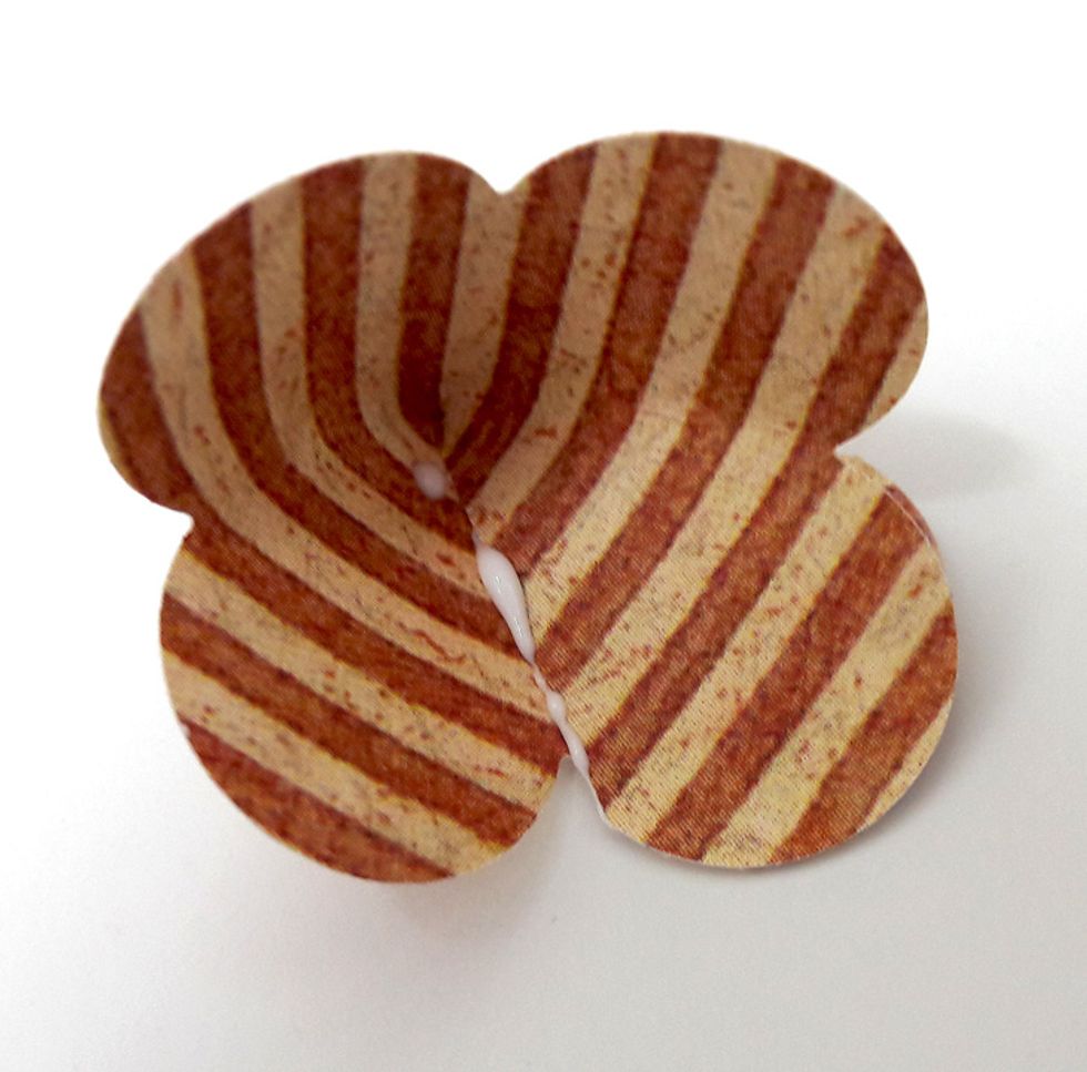 Attach right petal on left petal and "close" the flower.