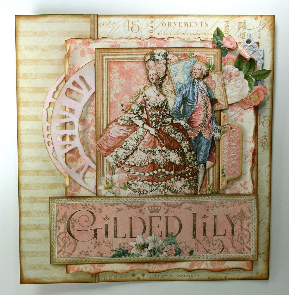 Attach tab from Gilded Lily Decorative Chipboard. Make sure to file down edge until smooth and ink.
