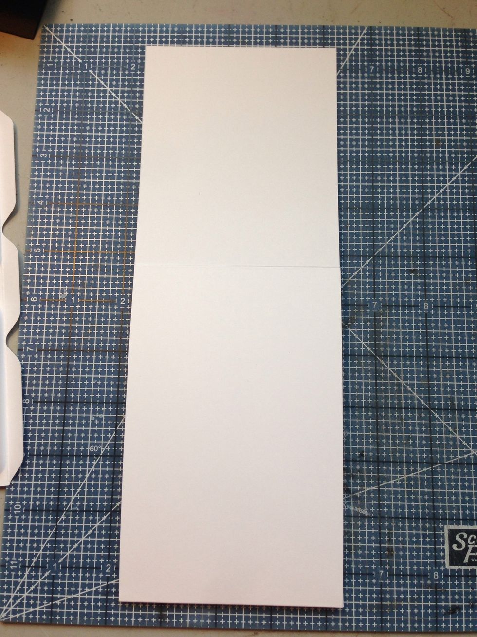 Attach tabs of smaller rectangle to larger to create a 6 1/4" sleeve with flap. Make 2 each of the two colors of card stock.