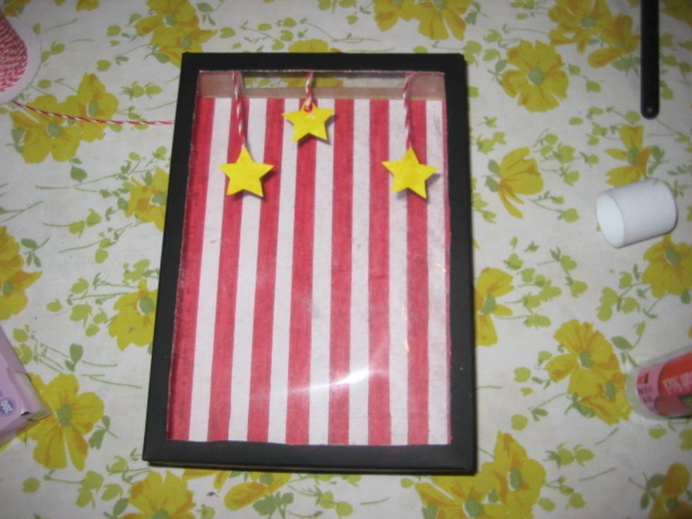 Attach the adhesive dots around the inside of the box and then attach the plastic. I kept the stars on the outside. If you need to adjust from the inside a ruler really does the job.