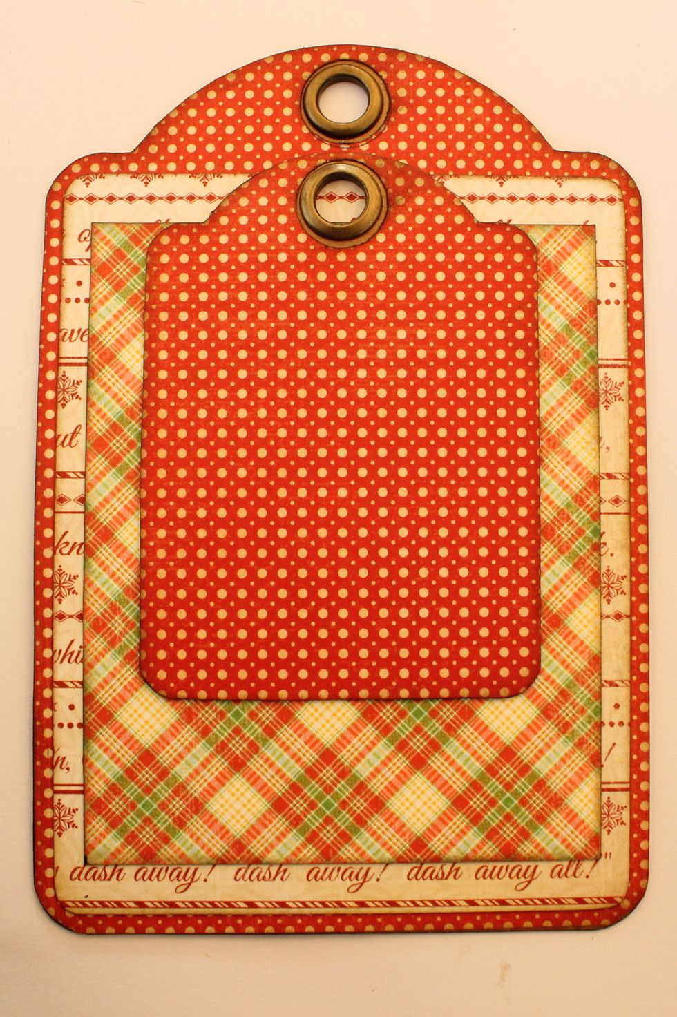 Attach the ATC tag on top of the larger tag.