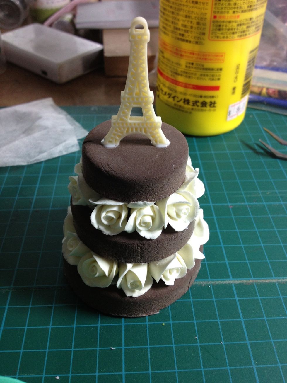 Attach the cake bases on and then glue the Paris Tower cabochon at the top.