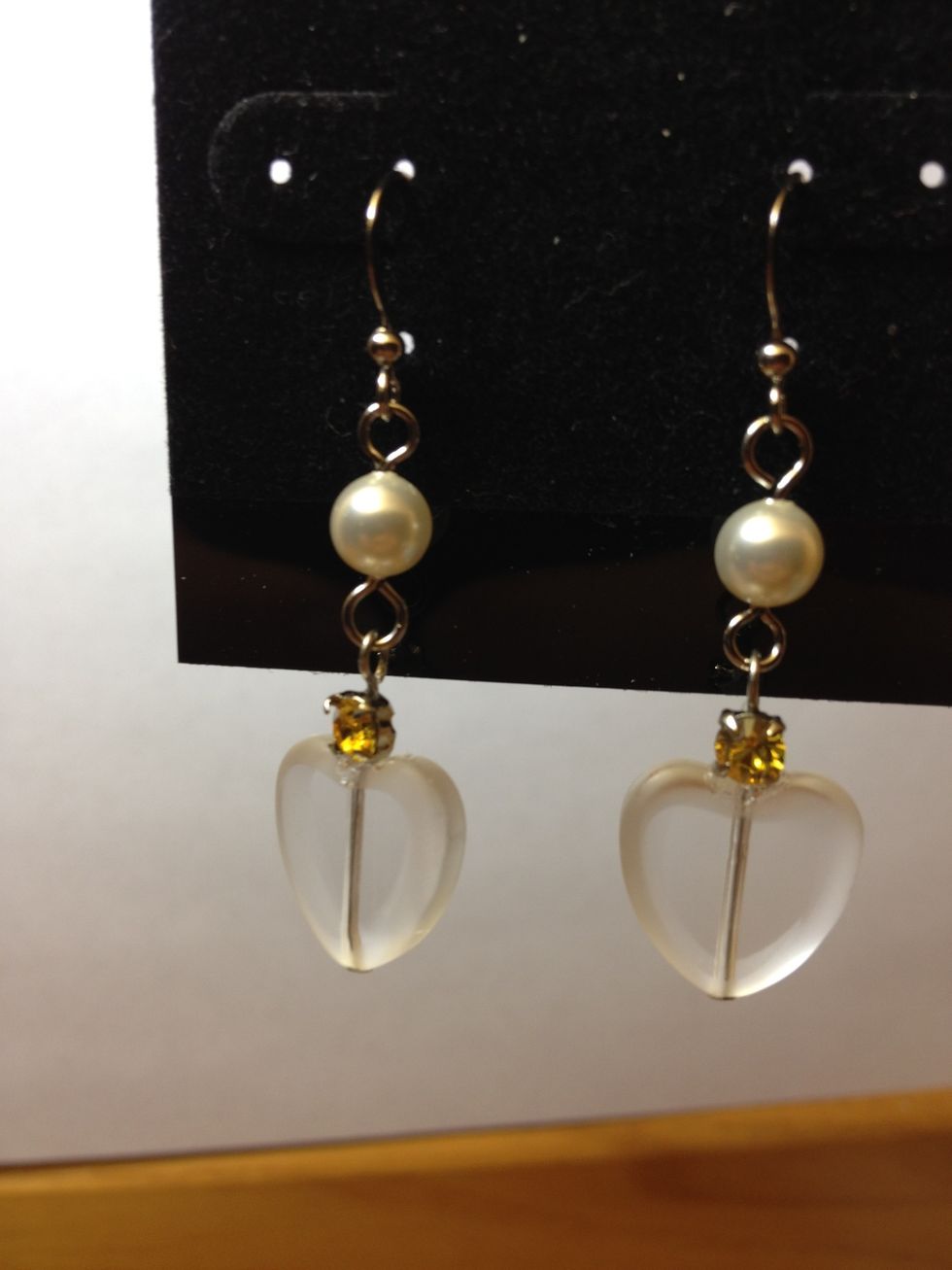 Attach the heart dangle to the bottom of the pearl. Take note of the angle of the eyepin, montee and the heart.