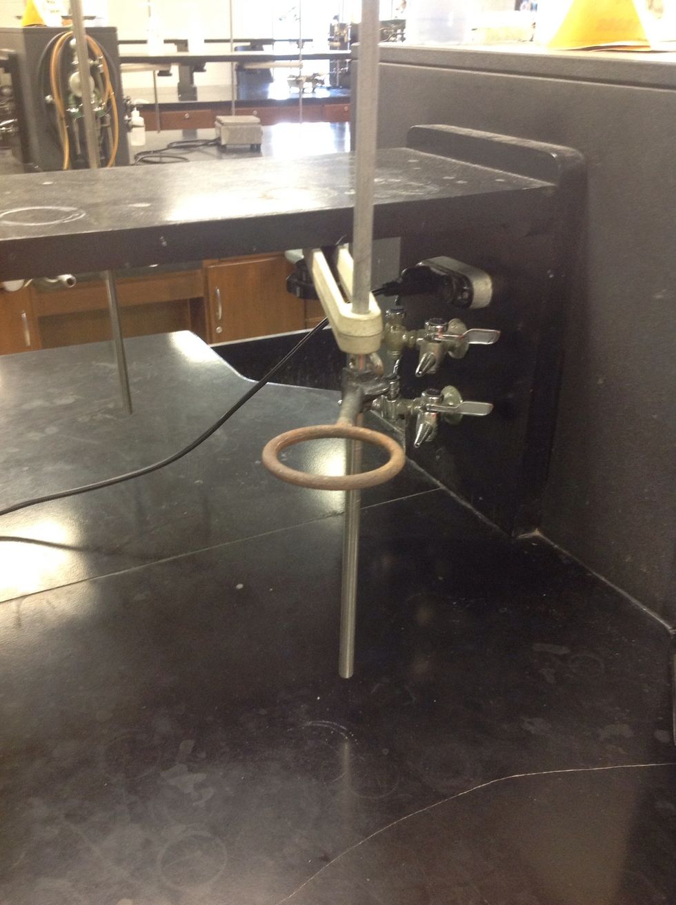 Attach the iron ring to the ring stand.