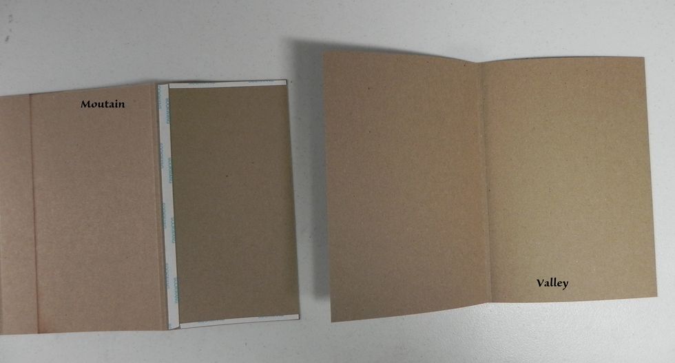 Attach the next main page (valley side up this time) to the pocket page which should be mountain side up. Line up with the first score line and flush along the sides.