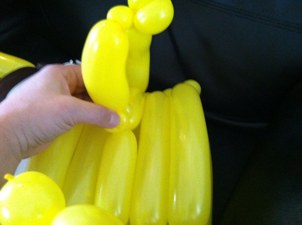 Attach the nose to the joint in the front of the sculpture